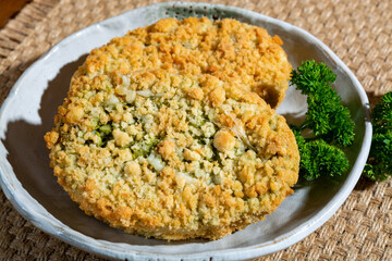 Uncooked fresh vegan and vegetarian burgers made from fresh vegetables and dried legumes and beans, ready to barbecue grill