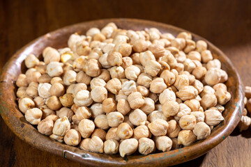 Portion of dried uncooked chick peas close up