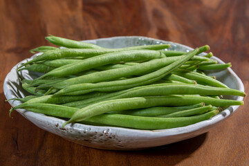 Raw fresh organic green beans ready to cook
