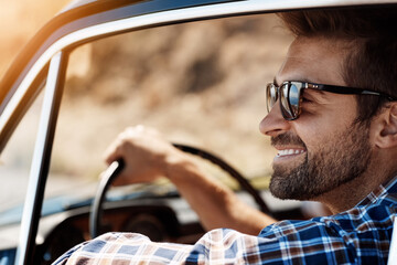 Road trip, happy and man travel in car driving for adventure, summer vacation and holiday. Transportation, relax and face of male person in motor vehicle for freedom, journey and happiness in window - Powered by Adobe
