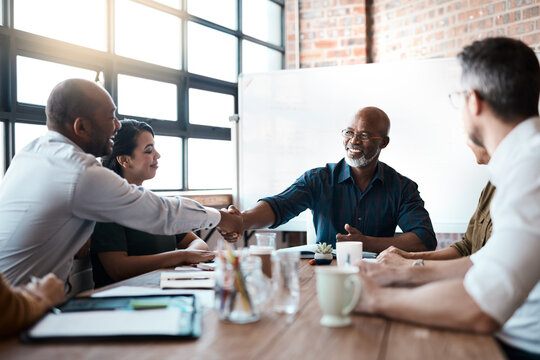 Business People, Meeting And Shaking Hands For Deal, Partnership And Senior Collaboration. Funny, Handshake And Black Men With Agreement, Congratulations Or B2b, Group Acquisition And Thank You.