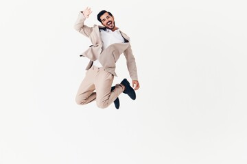 man victory suit businessman winner business happy smiling running model beige