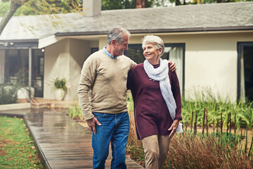 Love, garden and senior couple walking by their house for wellness, fresh air and bonding. Happy,...