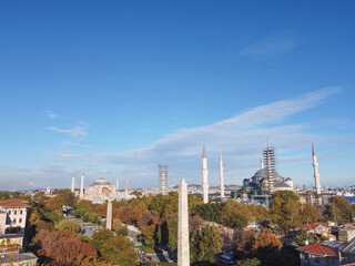 Fototapeta premium Touristic sightseeing ships in Golden Horn bay of Istanbul and mosque view city