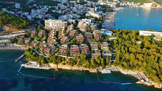Hotel Dukley with chic apartments, gardens and sandy beaches near the Adriatic Sea against the backdrop of the coastal Montenegrin cities