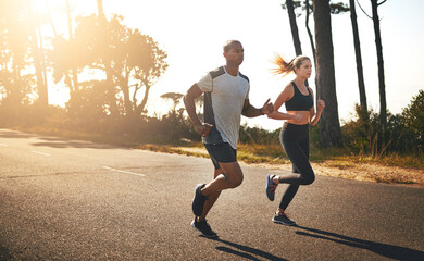 Fitness, running and freedom with couple in road for workout, cardio performance and summer....
