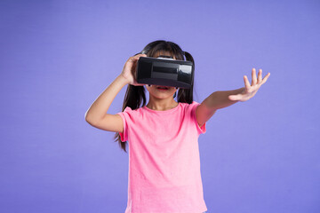 beautiful asian girl portrait posing on purple background