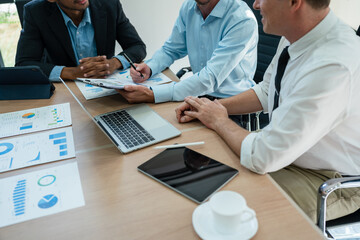 startup business, business advisor explaining strategy for planning finance investment teamwork paperwork audit and discussing marketing, profit, budget of company in meeting room.