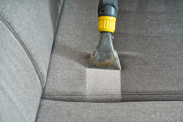 Sofa before and after wet - cleaning indoors. textile sofa vacuum cleaning. professional cleaning...
