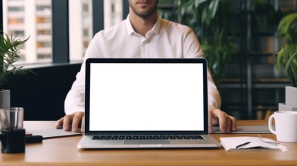 Young man using laptop computer with blank empty mockup screen. Business man working at office. Freelance, student lifestyle, e-learning, shopping online, web site, technolog.