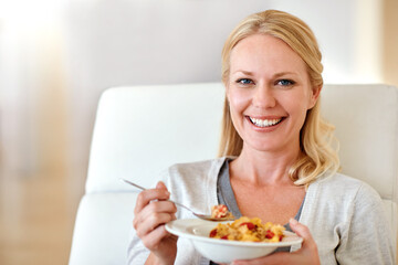 Obraz na płótnie Canvas Happy woman, portrait smile and cereal for healthy breakfast, meal or morning diet in living room at home. Female person smiling with food bowl of wheat or corn flakes for health, nutrition or fiber