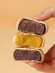 Cake made with purple sweet potato and pumpkin, moon cake, traditional Chinese pastry