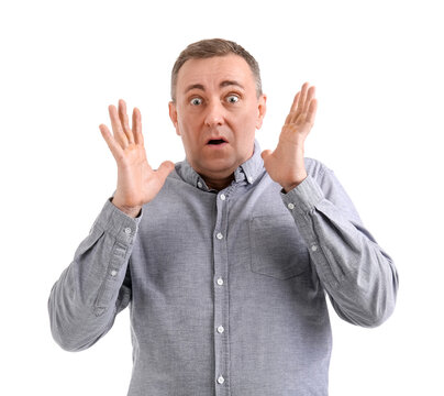 Scared mature man on white background