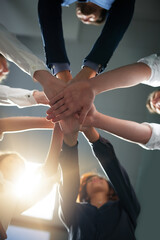 Hands together, solidarity and business people in team with low angle, support and trust with professional community. Diversity, collaboration and corporate group in meeting with goals and commitment