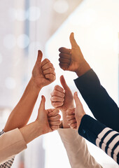 Hands, collaboration and thumbs up with a business team in the office together for motivation or success. Teamwork, yes and winner with an employee group in gesture of like, support or celebration