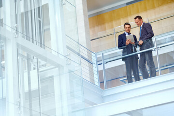 Thinking, corporate or business people with tablet for invest strategy, finance growth or financial review. Teamwork or manager in office building planning, data analysis or economy data research