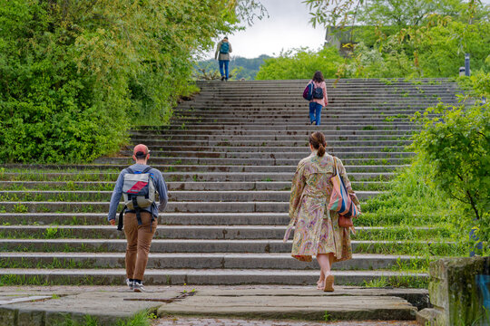 Students on the way to University Campus Irchel at City of Z&uuml;rich on a cloudy spring morning. Photo taken May 9th, 2023, Zurich, Switzerland.