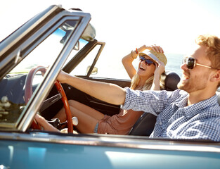 Car road trip, travel and happy couple laughing on holiday bond adventure, transportation journey or fun summer vacation. Love flare, convertible vehicle and driver driving on Canada countryside tour - obrazy, fototapety, plakaty
