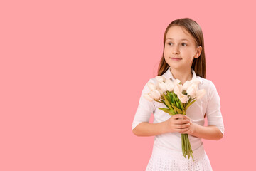 Little girl with tulips on pink background. Children's Day celebration