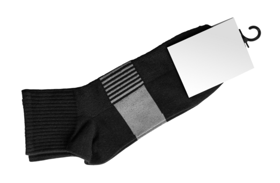 New socks on a transparent background. Socks in black with a blank label for your design. Isolated object