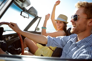 Car road trip, travel and happy couple laughing on holiday adventure, transportation journey or fun summer vacation. Love bond, convertible vehicle and male driver, man and woman driving in Canada