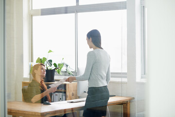 Documents, resignation letter and business women in office for quitting, termination and...
