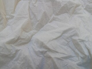 White Linen background Crumpled tissue Natural handmade tissue background Eco Organic top view White tissue linen texture