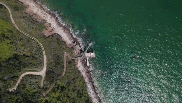 Impressive fishing platforms on stilts on the trabocchi coast Abruzzo 4k drone