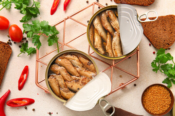 Canned smoked sprats with parsley on white background
