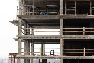 The walls of a multi-storey building under construction