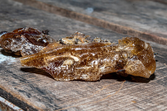 pieces of gum arabic, tree gum of pieces on wooden table backgrounds
