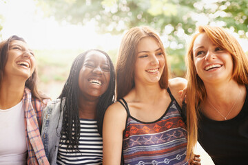 Girl friends, group and laugh outdoor with diversity in summer on holiday with travel. Female student, sunshine and happiness face of young gen z and teen people together on vacation feeling happy