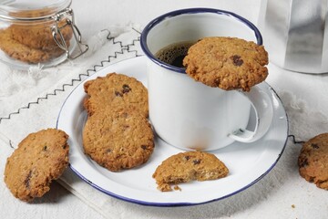 Raisin and Chocolate Chips Oat Cookies. Traditional British dessert snack or breakfast food