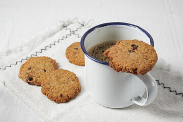 Raisin and Chocolate Chips Oat Cookies. Traditional British dessert snack or breakfast food