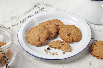 Raisin and Chocolate Chips Oat Cookies. Traditional British dessert snack or breakfast food