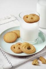 Butter Cookies assortment of four whole pretzels, round and rectangular shortbread biscuits with sugar. Traditional British dessert snack or breakfast food