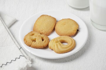 Butter Cookies assortment of four whole pretzels, round and rectangular shortbread biscuits with sugar. Traditional British dessert snack or breakfast food