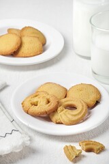 Butter Cookies assortment of four whole pretzels, round and rectangular shortbread biscuits with sugar. Traditional British dessert snack or breakfast food