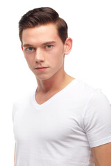 Fototapeta premium Fashion, young and portrait of man in studio with confidence, attractive and pride on white background. Youth, confident and face of isolated handsome male person with trendy style in casual clothes