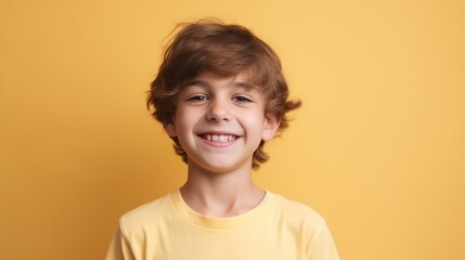 A cute little boy with a joyful smile, standing against a pastel-color background. Generative AI