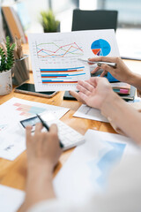 Businesswoman advisor, business people talking, planning analyze investment and marketing on tablet in office..