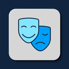 Filled outline Comedy and tragedy theatrical masks icon isolated on blue background. Vector