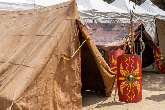 Badalona, Spain-May 7, 2023. Festival recreation of a Roman legion camp, shields, weapons, tents,