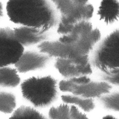 Seamless Black and white abstract pattern with chaotic different shapes of blots, hand painted, spot ink spread on a white paper