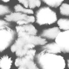 Seamless Black and white abstract pattern with chaotic different shapes of blots, hand painted, spot ink spread on a white paper