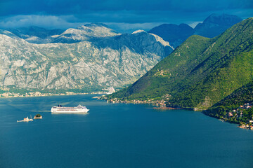 Bird's eye view of the Bay of Kotor, mountains, islands, passenger liner