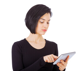 Fototapeta premium Serious, tablet and woman focus on social media using internet or online isolated in a studio white background. App, connection and female person typing email or search a website or web