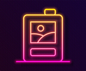 Glowing neon line Cardboard box of wine icon isolated on black background. Vector