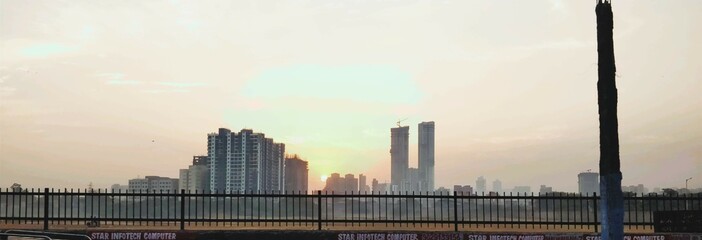 city skyline at sunrise
