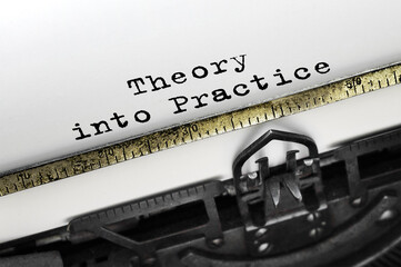 Text theory into practice typed on typewriter